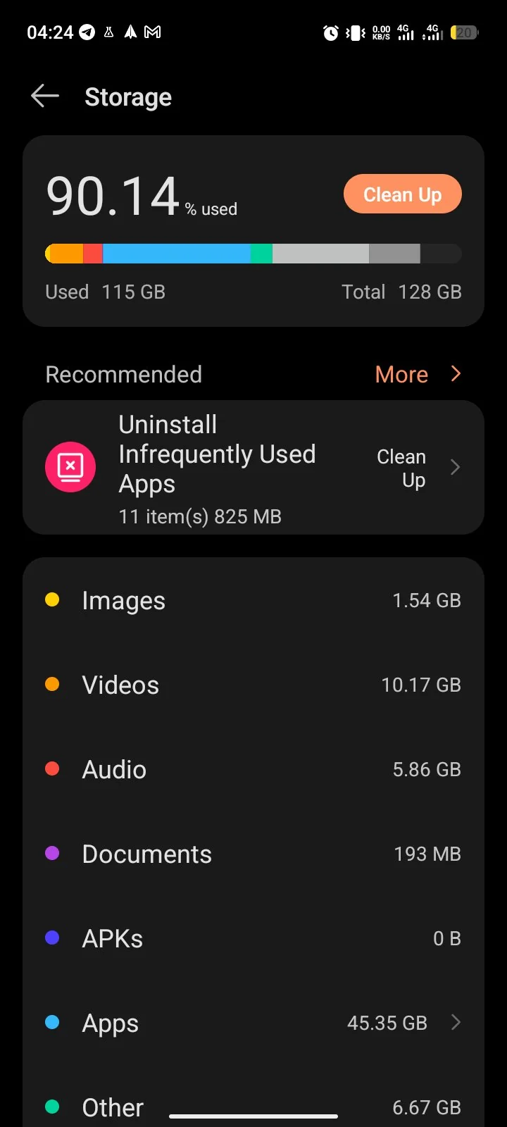 Storage overview screen on a Tecno Spark 40 showing 115 of 128 GB used with a Clean Up button and category breakdown